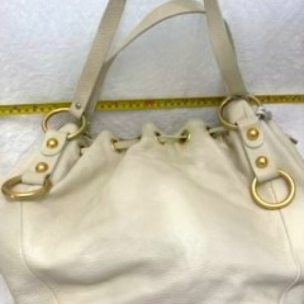 Aqua Madonna cream colored leather drawstring handbag